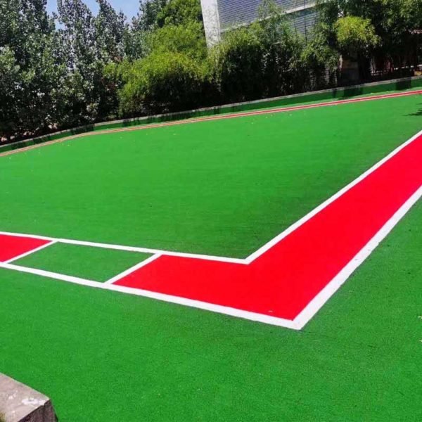 laying artificial grass